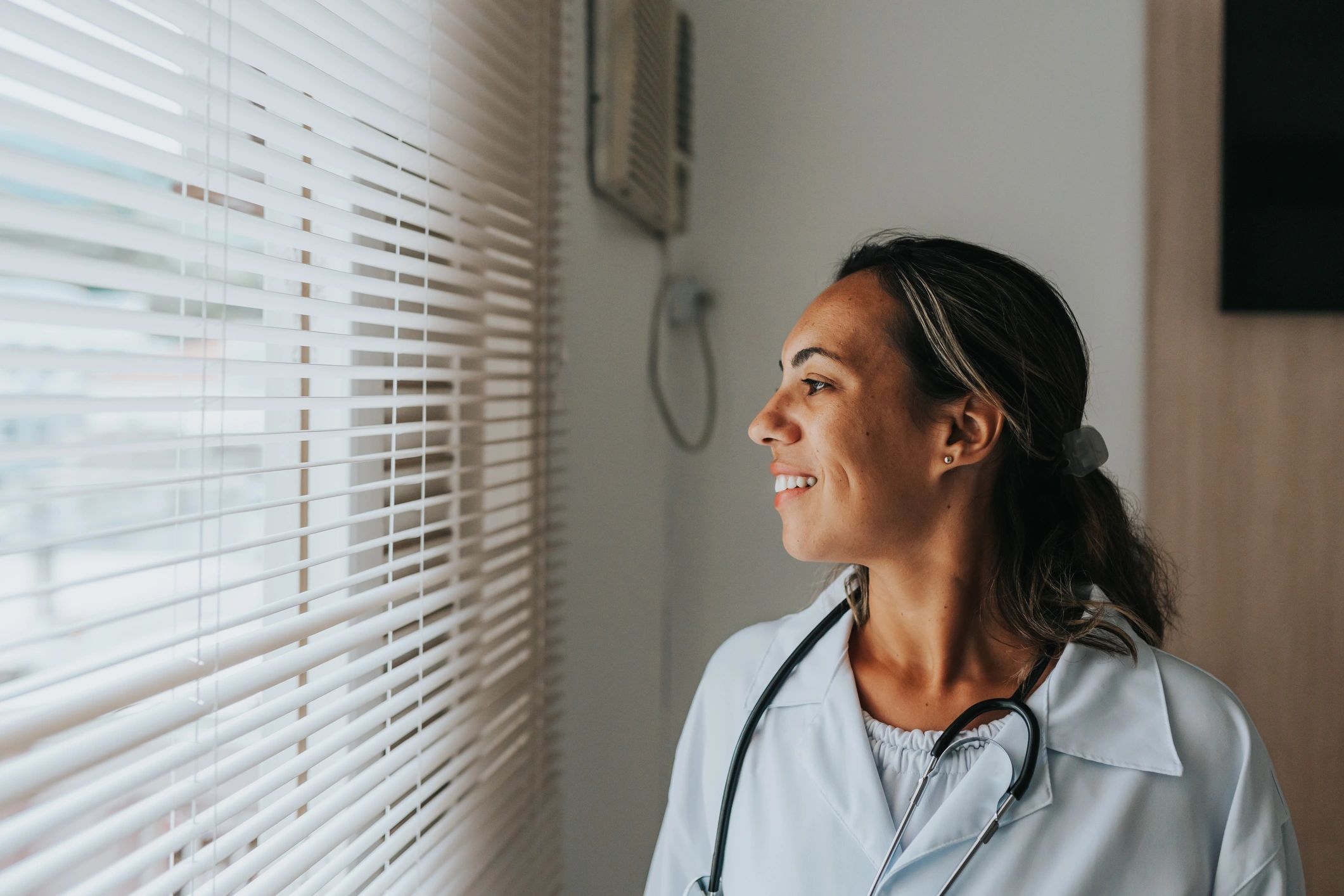 Doctor portrait near a window