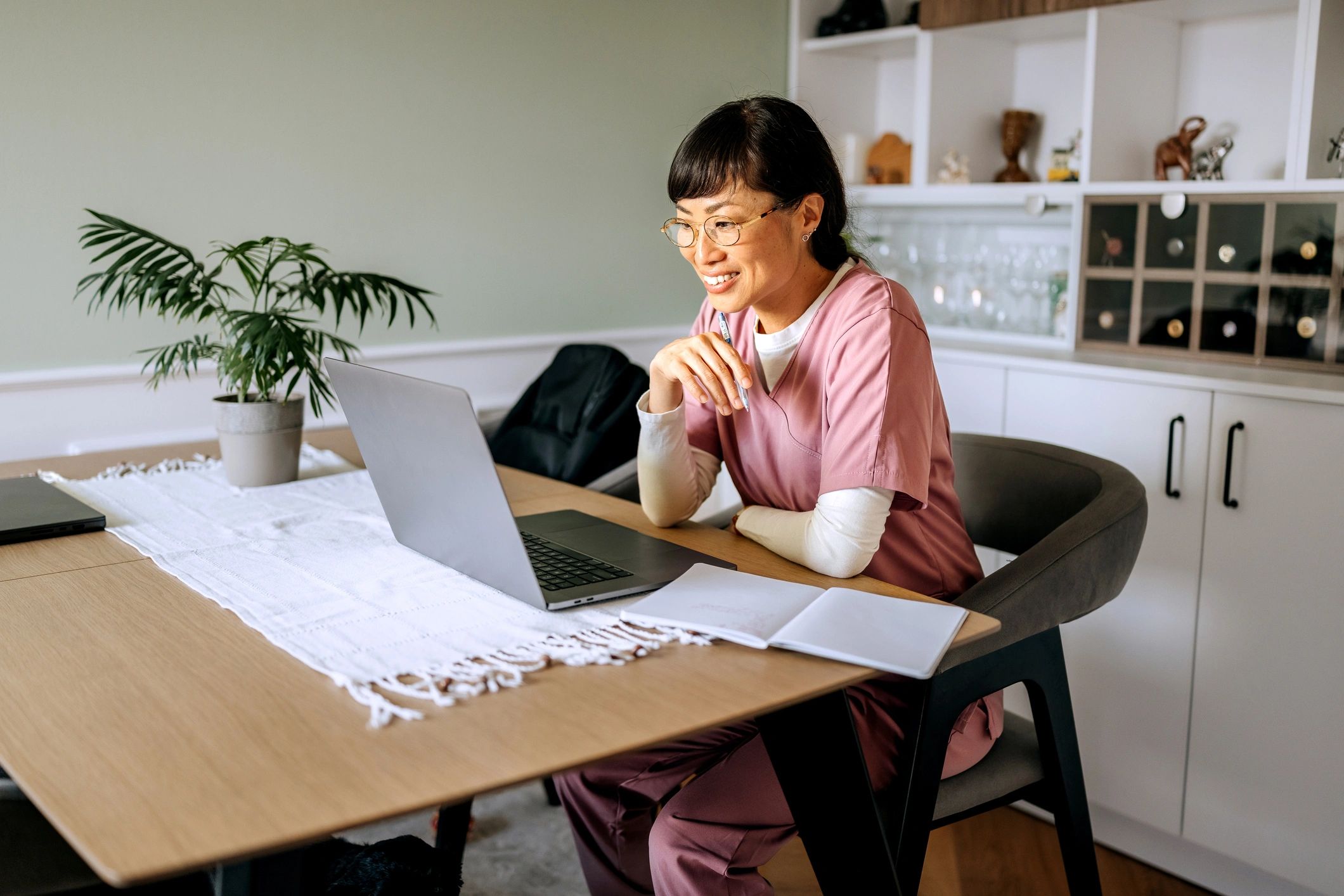 Person using a laptop for health education